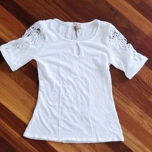 White top by Eyeshadow size medium